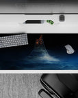 Deep blue moody gradient desk pad with subtle warm glow and dreamy stars, 36x16 inches.