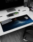 Sci-fi ring tower rising above blue clouds under a starry night desk pad, 36x16 inches.
