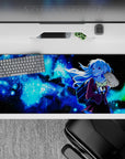 Cosmic anime girl desk pad 36x16 inches in icy blue gradients with glitter-like stars and dreamy mood.