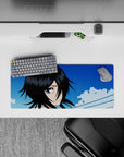 28x12 inches mouse pad with Rukia Kuchiki, showcasing her piercing gaze and soft blues for an elegant and powerful aesthetic.