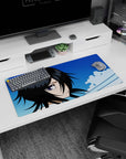 Modern 32x16 inches mouse pad with Rukia Kuchiki, featuring her piercing gaze, soft blues, and crisp lines for a Bleach-inspired design.