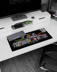 Valkyrie battroids and heavy artillery frames in a crowded lineup on a Macross desk mat, 28x12 inches.