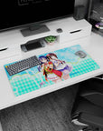 32x16 inches Love Live mouse pad showing Umi Sonoda and Dia Kurosawa in red-trim outfits with flower clip.