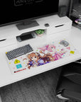 32x12 inches anime mouse pad showing curly brown girl with tiny horns and pink girl in headphones.