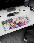 32x16 inches anime mouse pad showing a smiling brown-curled girl with tiny horns and a pink girl in headphones.