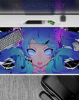 Neon cyber-pop anime desk pad 40x20 inches in violet, magenta, and black with a spooky cute vibe.