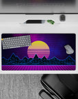 32x16 inches mouse pad with synthwave design, showcasing a glowing yellow sunset, neon blue mountains, and purple grid for digital 80s nostalgia.