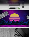 40x20 inches desk pad with synthwave design, showcasing a glowing yellow sunset, neon blue mountains, and purple grid landscape for a bold, retro vibe.