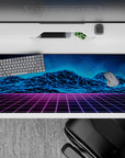 Striking 36x16 desk pad highlights glowing blue peaks, purple gridlines, and digital artistry in stunning detail
