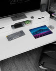 Iconic 14x10 desk mat celebrates Synthwave Mountains with glowing blue peaks, purple gridlines, and bold neon details