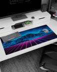 Neon artwork on 36x16 desk mat captures the essence of synthwave with bold colors and futuristic flair
