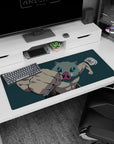 Inosuke from Demon Slayer mid-punch on 36x16 inch desk pad, boar mask, teal background, intense eyes and muscles.