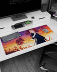 36x16 inches desk pad featuring a pink-haired sword-wielding anime girl framed by sunset clouds and grass.