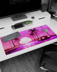 Artistic 36x16 inches desk pad featuring synthwave design, with a retro car, neon-lit road, and glowing retrowave sun for 80s-inspired nostalgia.