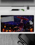 Cozy purple night anime desk mat 32x16 inches with soft snow specks, orange lantern lights, and hills.