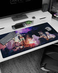 40x20 inches anime desk pad with silver-haired adventurer by the fire, knight, mage, and cleric nearby.