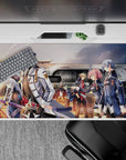 40x20 inches anime mouse pad in warm orange sunset glow with navy coats, steel trim, and pink hair accents.