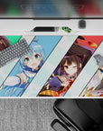 Anime desk pad 40x20 inches with KonoSuba characters: Kazuma stressed, Aqua proud, Megumin winking, Darkness joyful.