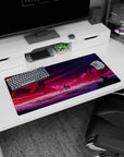 Modern 32x16 inches mouse pad featuring alien world design, with glowing city lights, jagged mountains, and a cosmic sky for mystery and adventure.