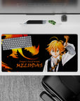 Black mouse pad with fiery orange-gold dragon glow and intense anime vibe, 32x16 inches.
