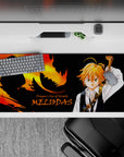 Black desk pad with fiery orange-gold dragon glow and intense wrath vibe, 36x16 inches.