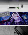 Indigo and icy blue anime desk pad 36x16 inches with snowy specks and crimson accents, dark mystic mood.