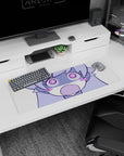 Chibi anime girl with puffy cheeks and playful stare guarding your desk setup mouse pad, 32x12 inches.