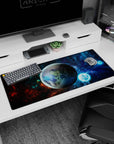 Space scene desk pad featuring a glossy planet with electric light rings and stars, 36x16 inches.