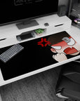 Chibi anime girl in full rage mode, fist up, blushing face and anger symbol desk pad, 40x20 inches.