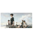 Mouse pad featuring Eren, Mikasa, and Levi, 32x16 inches, with golden hues and dramatic sky to inspire quiet determination.