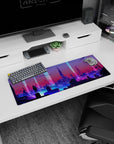 Artistic 32x12 inches mouse pad featuring futuristic cityscape, with neon lights and a lone figure for a tech-inspired vibe.