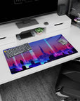 Modern 32x16 inches mouse pad featuring futuristic cityscape, neon lights, and a lone figure for an inspiring, tech-driven workspace.
