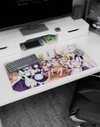 32x16 inches anime girl mouse pad showing a winking maid catgirl serving sweets at tea time.