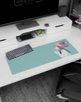 32x12 inches extended mouse pad showing anime girl in a blush beanie sipping hot drink on a teal backdrop.