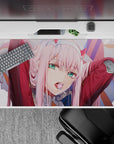 40x20 inches desk pad with Zero Two from Darling in the Franxx, capturing her bold spirit with a lollipop and intense look in her eyes.