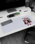 36x16 inches desk pad showing smiling glasses anime girl posing as a tiny UFO hovers like a desk buddy.