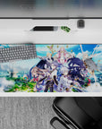 36x16 inches anime desk pad in bright sky blues with gold sparkles, silver armor, and magical energy arcs.
