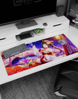 Anime shrine maiden by a glowing lake with falling petals and butterflies on a 36x16 inches desk pad.