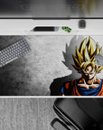 40x20 inches desk pad showcasing Goku’s Super Saiyan silhouette, with bold light and shadow contrasts for a powerful, minimalist aesthetic.