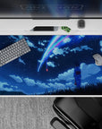 40x20 inches anime desk pad in deep navy with neon blue and pink comet trails, calm dreamy glow.