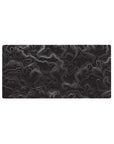 Monochrome topo mouse pad featuring flowing contour lines, 32x16 inches, ideal for minimalist workspaces and gaming setups.