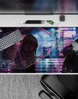40x20 inches desk pad in violet, cyan, and pink neon glow with moody late-night rain ambiance.