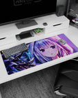 36x16 inches Re:Zero Emilia desk pad with shy starry eyes, silver hair, flower clip, snowy branches.