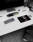Silver-haired neko maid sits with a sleeping kitten on her lap on anime mouse pad, 14x10 inches.