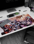 Anime girl desk pad 40x20 inches featuring sharp-eyed girls aiming pistols as money flutters around them.