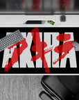 Cyberpunk black anime desk pad 40x20 inches, stark white lettering and raw crimson paint for gritty mood.
