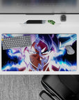 32x16 inches mouse pad showcasing Goku’s Ultra Instinct, with a powerful transformation and glowing energy for an intense workspace.