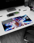 Modern 32x16 inches mouse pad with Goku in Ultra Instinct, capturing his energy and transformation for a dynamic, action-filled desk setup.