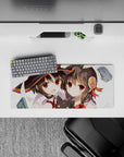 Megumin and Yunyun from Konosuba on a 28x12 inch mouse pad, showcasing their chaotic friendship with chibi Chomusuke.