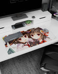 Megumin and Yunyun from Konosuba clash on a 32x16 inch anime mouse pad, with chibi Chomusuke and magical chaos.